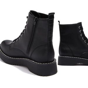 Black combat boots. New, still in box.